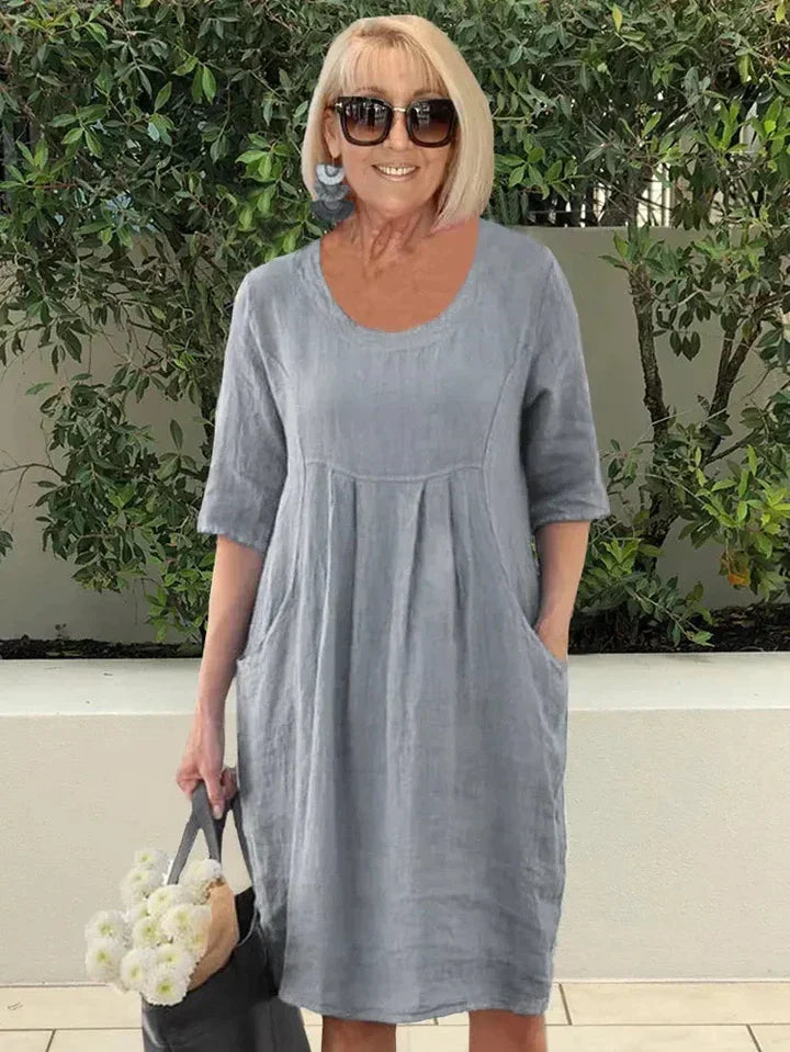 Amelie – Elegant tunika-midiklänning med fickor för en avslappnad stil