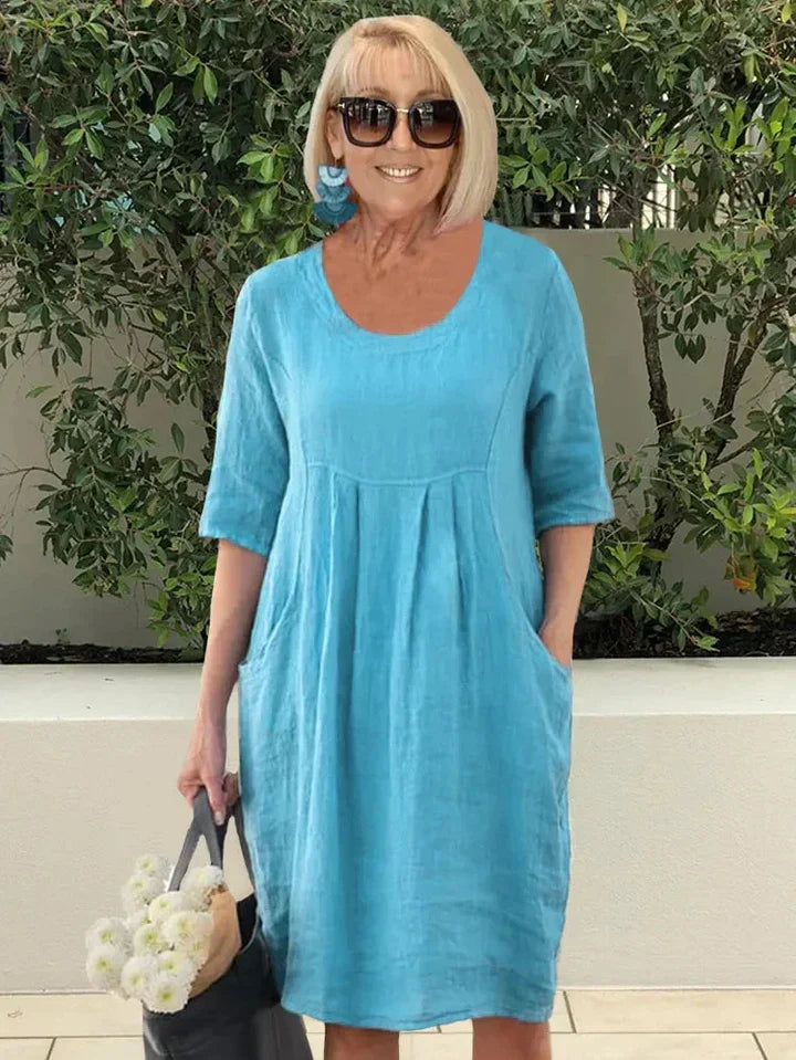 Amelie – Elegant tunika-midiklänning med fickor för en avslappnad stil