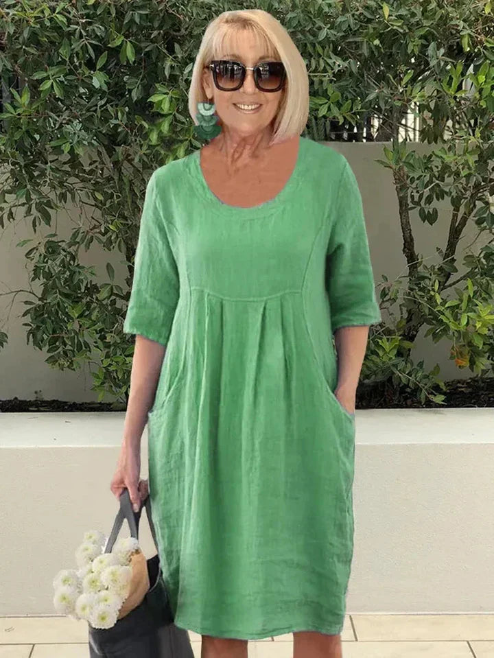 Amelie – Elegant tunika-midiklänning med fickor för en avslappnad stil