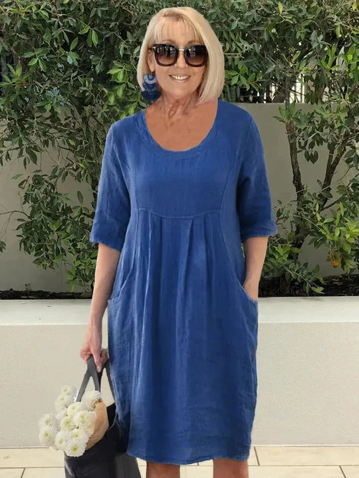Amelie – Elegant tunika-midiklänning med fickor för en avslappnad stil